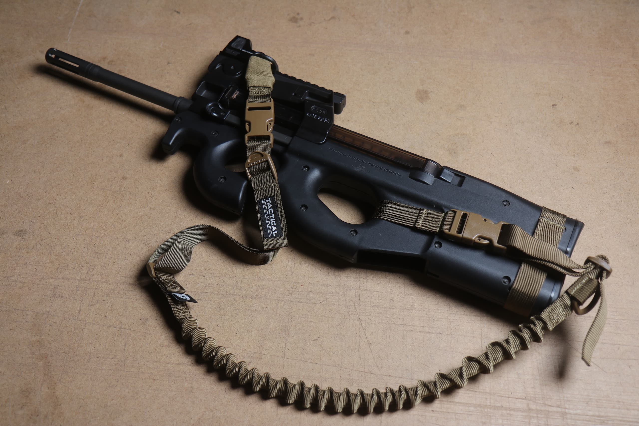 Coyote Harness Wrapped around a P90 in a two point sling configuration.